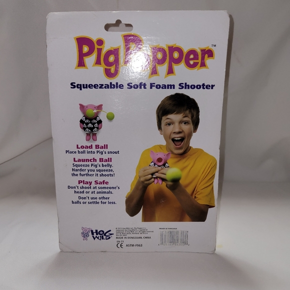 Pig Popper Squeezeble Foam ball soft shooter comes w/6 balls NIB - Picture 2 of 4